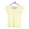 Vintage yellow Bootleg Lacoste T-Shirt - womens medium