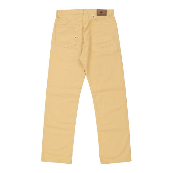 Vintage yellow Lacoste Trousers - mens 32" waist