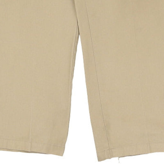 Dickies Trousers - 36W 29L Khaki Polyester Blend - Thrifted.com