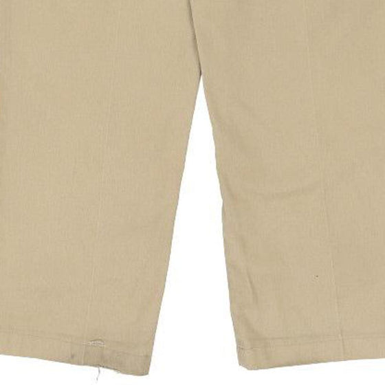 Dickies Trousers - 36W 29L Khaki Polyester Blend - Thrifted.com