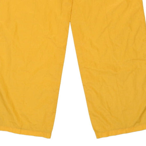 Vintage yellow Lacoste Tracksuit - mens small