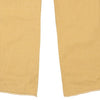 Vintage yellow College Jeans - womens 30" waist