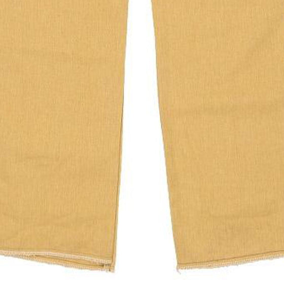 Vintage yellow College Jeans - womens 30" waist