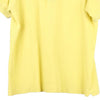 Vintage yellow Lacoste Polo Shirt - mens medium