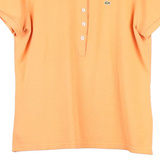 Vintage orange Lacoste Polo Shirt - womens large