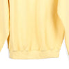 Vintage yellow NIU Russell Athletic Hoodie - womens large