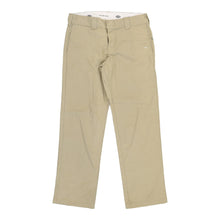  Lightly Worn Dickies Trousers - 33W 31L Beige Polyester Blend - Thrifted.com