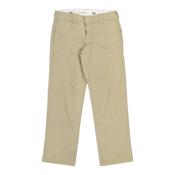 Lightly Worn Dickies Trousers - 33W 31L Beige Polyester Blend - Thrifted.com