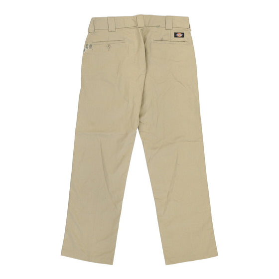 Lightly Worn Dickies Trousers - 33W 31L Beige Polyester Blend - Thrifted.com