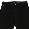 Vintage black Lee Jeans - womens 34" waist