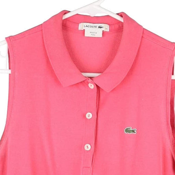 Vintage pink Lacoste Polo Shirt - womens small