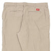 Vintage beige Dickies Trousers - womens 34" waist