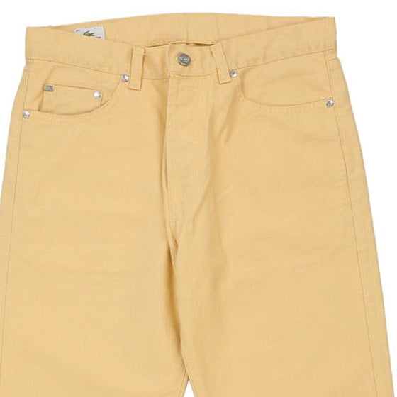 Vintage yellow Lacoste Trousers - mens 32" waist