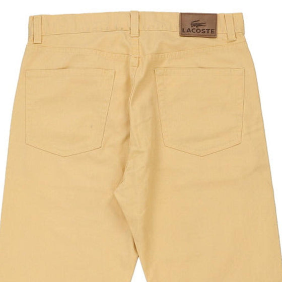 Vintage yellow Lacoste Trousers - mens 32" waist