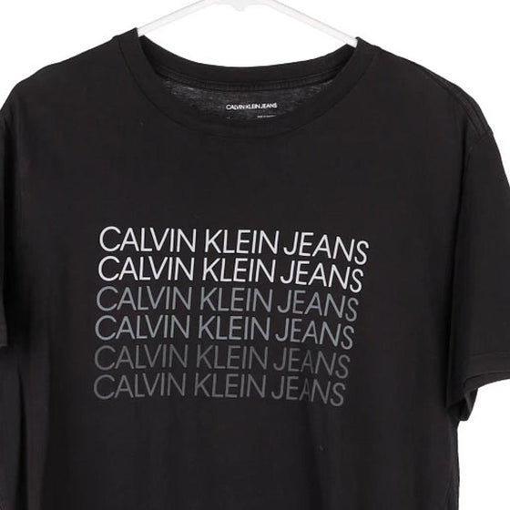 Pre-Loved black Calvin Klein Jeans T-Shirt - mens medium